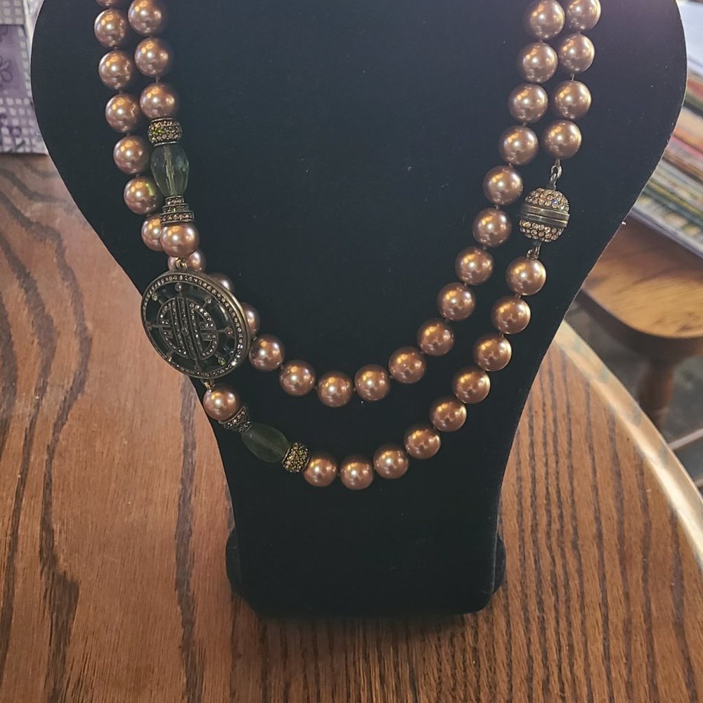 Gold colored pearl necklace